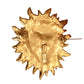 YVES SAINT LAURENT- 1980s Gilt Sculpted Sun Brooch