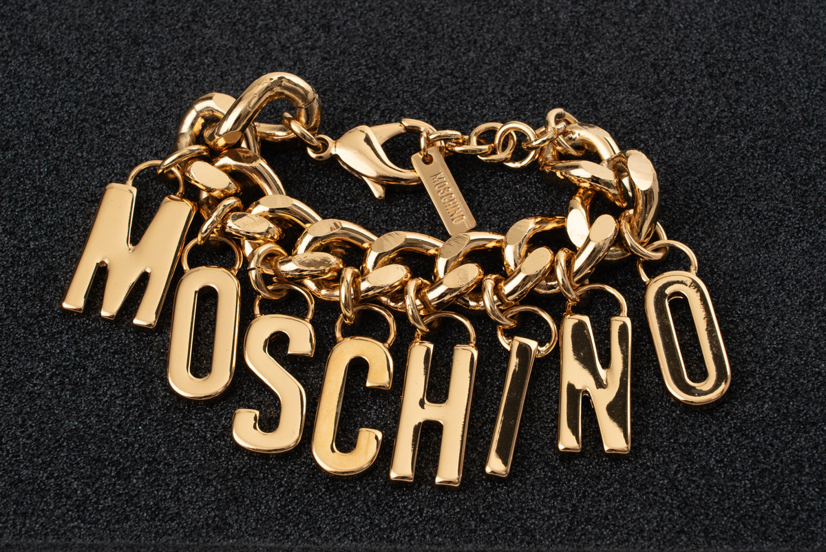 MOSCHINO COUTURE! - 2022 Gold-Tone Charm Bracelet